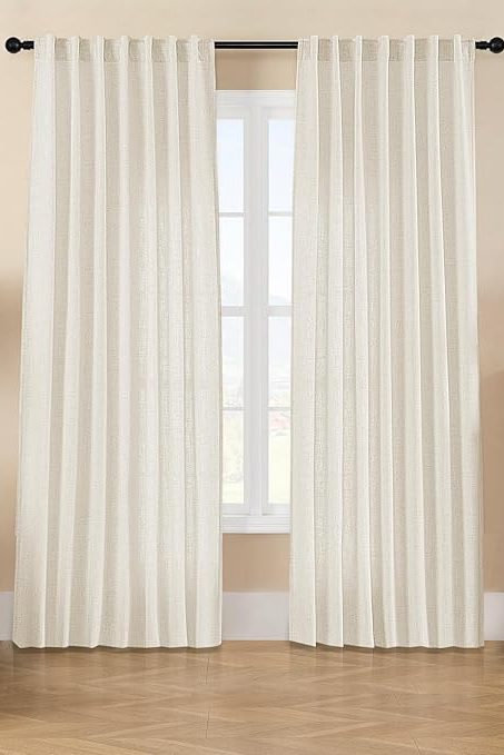 Joydeco custom off-white linen blend light filtering curtains framing a window with a chair and fireplace. Joydeco light cream linen curtains, pinch pleat, filtering light in a modern living room. Joydeco light cream linen blend curtains, semi-sheer textured weave filtering light and providing privacy in a living room. Joydeco light cream linen textured curtains on black rod, filtering light for semi-sheer living room privacy. Joydeco cream linen blend curtains with visible textured weave, showcasing light filtering for a living room. Close-up of ivory linen fabric texture, ideal for light filtering curtains, showing natural slubs and elegant drape. Joydeco cream linen blend sheer curtains, light filtering texture on product page. Joydeco cream linen blend curtain fabric texture close-up with header detail. Sage green linen-look sheer curtains light filtering into a living room, shown on a black rod. Custom ivory linen blend light filtering curtains by Joydeco, semi-sheer, in a living room. Joydeco Custom Linen Light Filtering Curtains Joydeco Custom Linen Light Filtering Curtains Ebony Grey Joydeco linen curtains with back tabs filter light in living room. Ecru Joydeco custom linen light filtering curtains styled in a living room with a nightstand and botanical print. Joydeco Custom Linen Light Filtering Curtains Joydeco Custom Linen Light Filtering Curtains Joydeco Custom Linen Light Filtering Curtains Joydeco Custom Linen Light Filtering Curtains Pink beige Joydeco linen light filtering curtains in a living room setting. Joydeco Pistachio Shell Linen Curtains, light filtering, in living room with soft light. Joydeco Custom Linen Light Filtering Curtains Joydeco Custom Linen Light Filtering Curtains Joydeco custom off-white linen blend light filtering curtains framing a window with a chair and fireplace. Open media 1 in gallery view Joydeco light cream linen curtains, pinch pleat, filtering light in a modern living room. Open media 2 in gallery view Joydeco light cream linen blend curtains, semi-sheer textured weave filtering light and providing privacy in a living room. Open media 3 in gallery view Joydeco light cream linen textured curtains on black rod, filtering light for semi-sheer living room privacy. Open media 4 in gallery view Joydeco cream linen blend curtains with visible textured weave, showcasing light filtering for a living room. Open media 5 in gallery view Close-up of ivory linen fabric texture, ideal for light filtering curtains, showing natural slubs and elegant drape. Open media 6 in gallery view Joydeco cream linen blend sheer curtains, light filtering texture on product page. Open media 7 in gallery view Joydeco cream linen blend curtain fabric texture close-up with header detail. Open media 8 in gallery view Sage green linen-look sheer curtains light filtering into a living room, shown on a black rod. Open media 9 in gallery view Custom ivory linen blend light filtering curtains by Joydeco, semi-sheer, in a living room. Open media 10 in gallery view Joydeco Custom Linen Light Filtering Curtains Open media 11 in gallery view Joydeco Custom Linen Light Filtering Curtains Open media 12 in gallery view Ebony Grey Joydeco linen curtains with back tabs filter light in living room. Open media 13 in gallery view Ecru Joydeco custom linen light filtering curtains styled in a living room with a nightstand and botanical print. Open media 14 in gallery view Joydeco Custom Linen Light Filtering Curtains Open media 15 in gallery view Joydeco Custom Linen Light Filtering Curtains Open media 16 in gallery view Joydeco Custom Linen Light Filtering Curtains Open media 17 in gallery view Joydeco Custom Linen Light Filtering Curtains Open media 18 in gallery view Pink beige Joydeco linen light filtering curtains in a living room setting. Open media 19 in gallery view Joydeco Pistachio Shell Linen Curtains, light filtering, in living room with soft light. Open media 20 in gallery view Joydeco Custom Linen Light Filtering Curtains Open media 21 in gallery view Joydeco Custom Linen Light Filtering Curtains Open media 22 in gallery view Joydeco Custom Linen Light Filtering Curtain