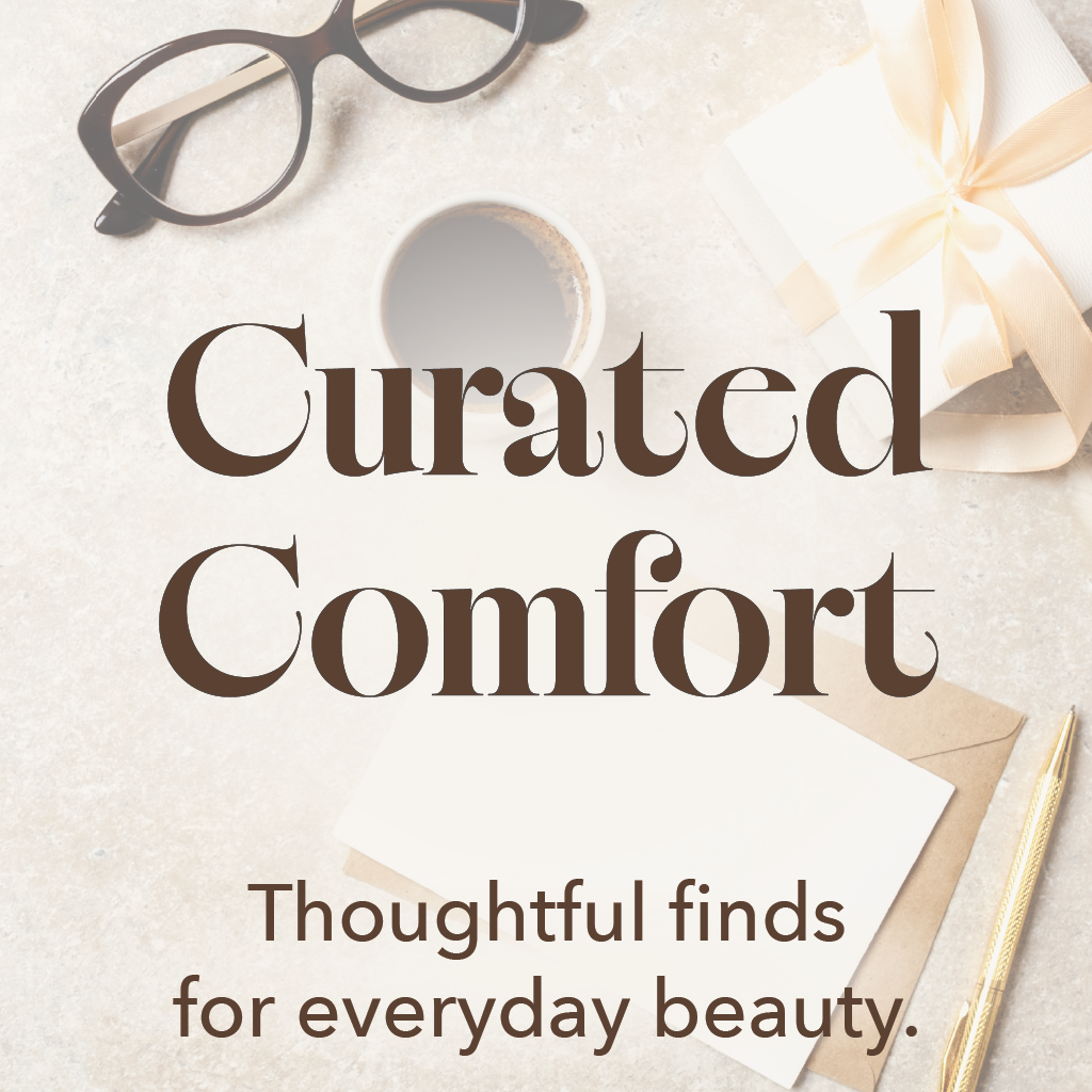 Curated Comfort collection featuring thoughtful gift ideas and everyday lifestyle finds styled in a neutral flat lay with coffee, stationery, and wrapped package.
